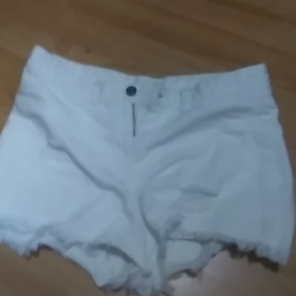 Ripped white shorts
